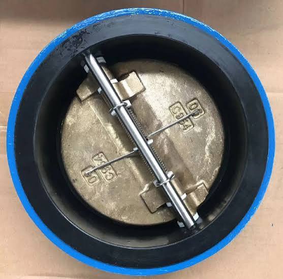 Butterfly check valve for industrial backflow prevention in piping systems